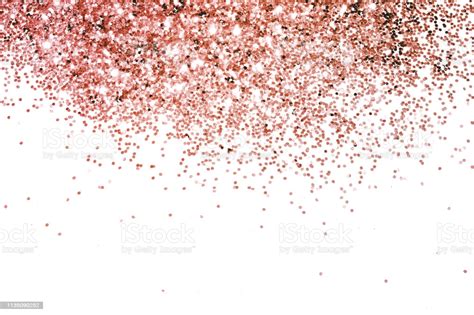 Rose Gold Glitter On White Background Stock Photo