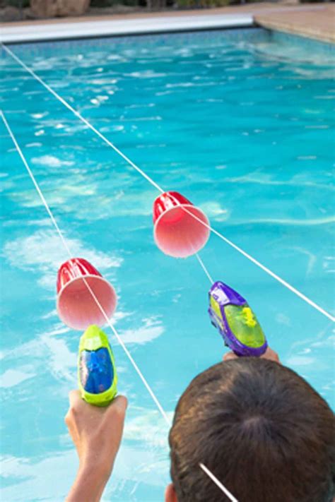 Kick Off Summer With This Inflatable Cornhole Set Swimming Pool Games