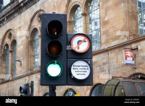 Green Traffic Light Signal With No Right Turn Except Buses Taxis Cycles
