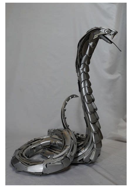 Car Creatures Artist Makes Recycled Art From Hubcaps Webecoist