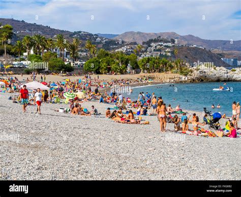 Bathers On The Pebble Beach Of La Herradura Costa De Tropical Granada