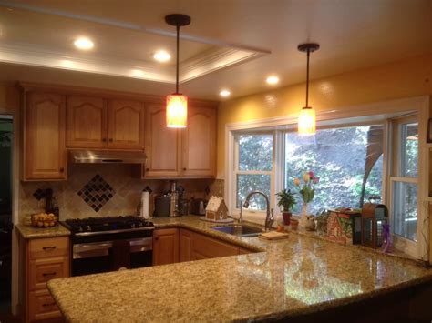 Depending on the size of the soffit to the total area of the kitchen you may need to add recessed lights around the perimeter of the. Update your old kitchen lighting with recessed LED ...