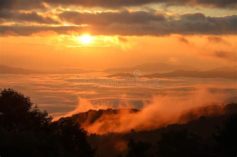 Morning Mist With Mountain At Sunrise Stock Photo Image Of Orange