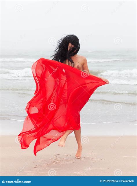 Nude Woman In Red Fabric Posing On Sea Beach Stock Photo Image Of Caucasian Erotic