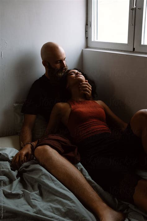 Couple Caressing In Bed Del Colaborador De Stocksy Thais Ramos Varela Stocksy