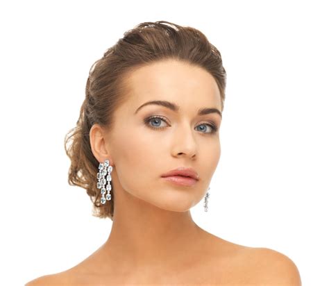 Premium Photo Close Up Of Beautiful Woman Wearing Shiny Diamond Earrings