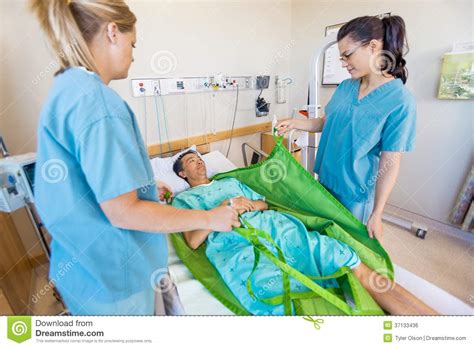 Nurses Preparing Patient Before Transferring Him Royalty Free Stock