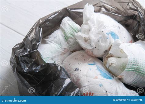 Diapers Waste Dirty Diapers In Trash Bag Disposing Of Used Baby