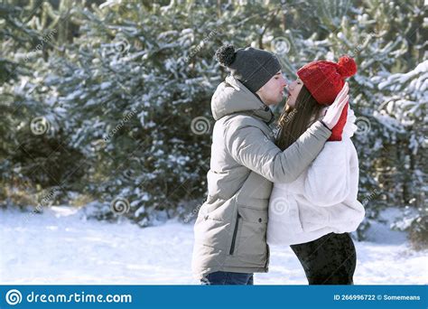 Guy Kissed His Girlfriend Young Couple In Love Has Fun In Winter