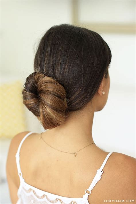 Sweep your hair around to the right side of your head and find a secure spot to tuck. 5 Easy One Minute Heatless Hairstyles | Heatless ...