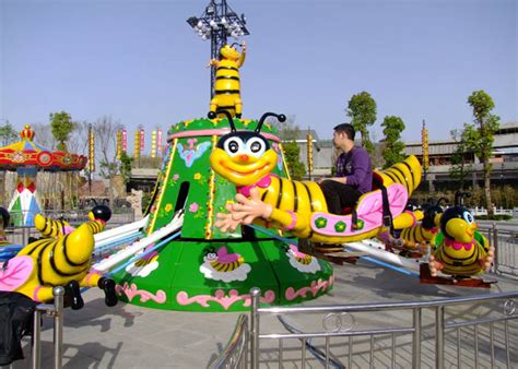 Mix water and vinegar in 1 to 1 ration and apply it around the nest. Going On A Bumble Bee Ride At A Carnival - Premium ...