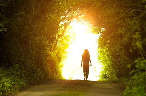 Girl Walking Towards The Light Stock Photo Download Image Now Istock