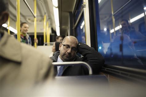 Tired Mature Businessman Commuter Sleeping On Bus Unherd