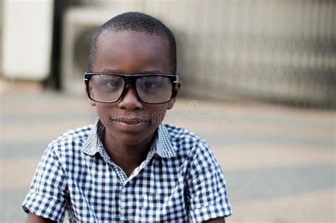 Portrait Of Boy In Glasses Stock Photo Image Of Sitting Looking