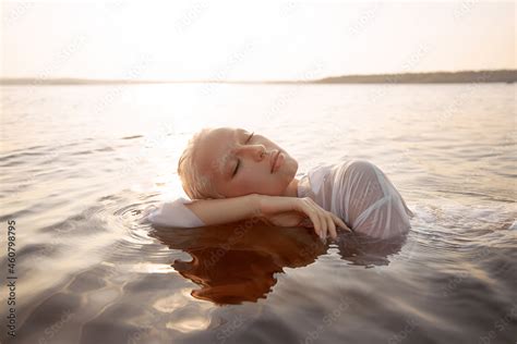 Nude Naked Sexy Woman In Water At Sunset Beautiful Blonde Woman With Short Wet Hair And Big