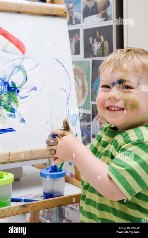 Little Boy With Paint Stock Photo Alamy