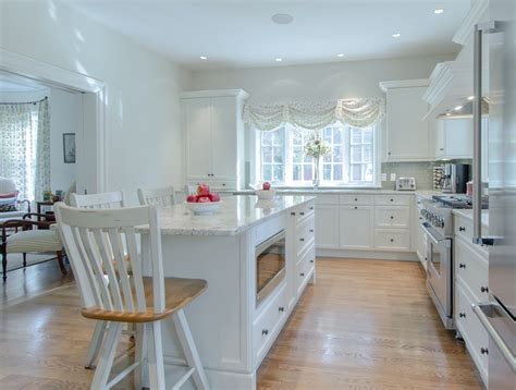 The kitchen island features five storage drawers and two spacious cabinets, making kitchen organization a breeze. Kitchen Island - white paitned cabinetry, kitchen island ...
