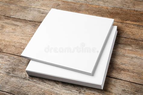 Stack Of Blank Paper Sheets For Brochure On Wooden Background Stock