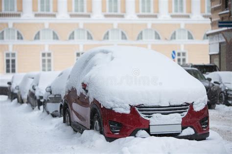 Car Covered In A Thick Layer Of Snow Street Of St Stock Photo Image