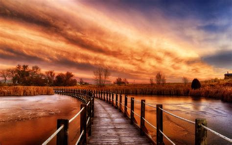 Wooden Bridge River Grass Nature Sunset Clouds Red Sky Wallpaper