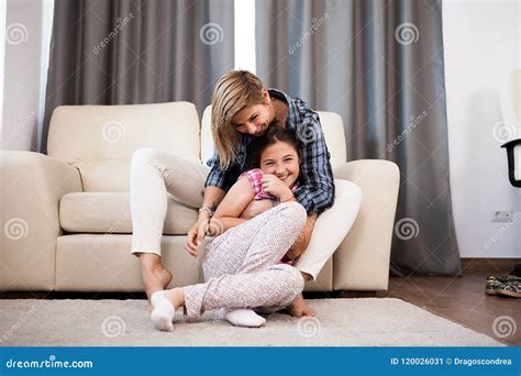 Mother Is Cuddling Her Teenage Daughter Stock Image Image Of Girl