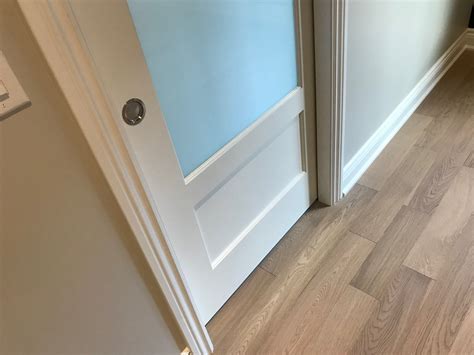Using a premium benjamin moore nylon/polyester brush, apply the first coat of advance paint. Trim and doors sprayed in Benjamin Moore Advance pearl ...