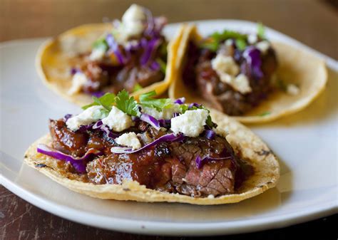 Chop the steak and toss it with the spice rub. Steak Tacos with Chipotle Cherry Salsa and Caramelized ...