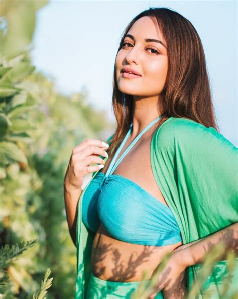 Sonakshi Sinha Flaunts Washboard Abs In A Blue Bikini Top And Green Flared Pants In Pics From