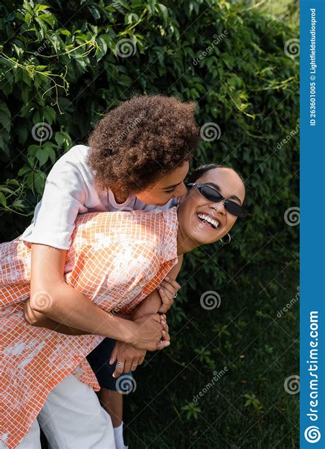 Happy African American Lesbian Woman Embracing Stock Image Image Of Cheerful Green 263601005