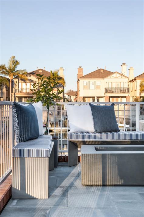Coastal Waterfront Patio With Benches Hgtv