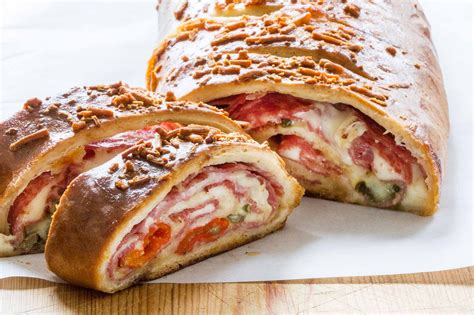 You can build your stromboli up to 24 hours in advance of baking and keep it tightly wrapped on a baking sheet in the fridge until baking time. Easy Ham and Cheese Stromboli | Recipe | Food recipes ...