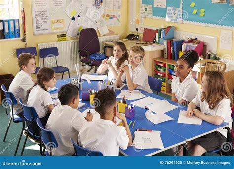 School Kids Work Together On A Class Project Elevated View Stock Photo