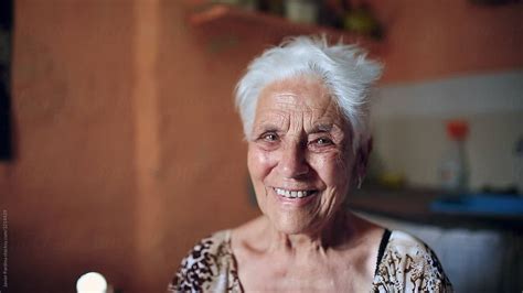Portrait Of Senior Woman At Home Del Colaborador De Stocksy Javier