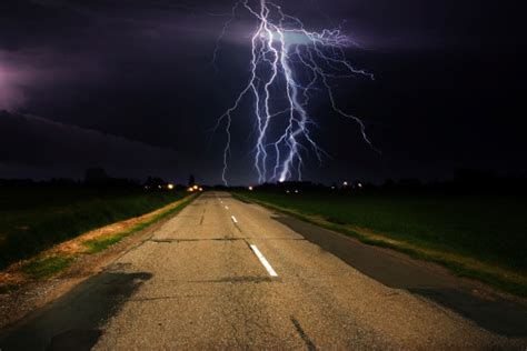 Lightning Over Asphalt Road Stock Photo Download Image Now Istock
