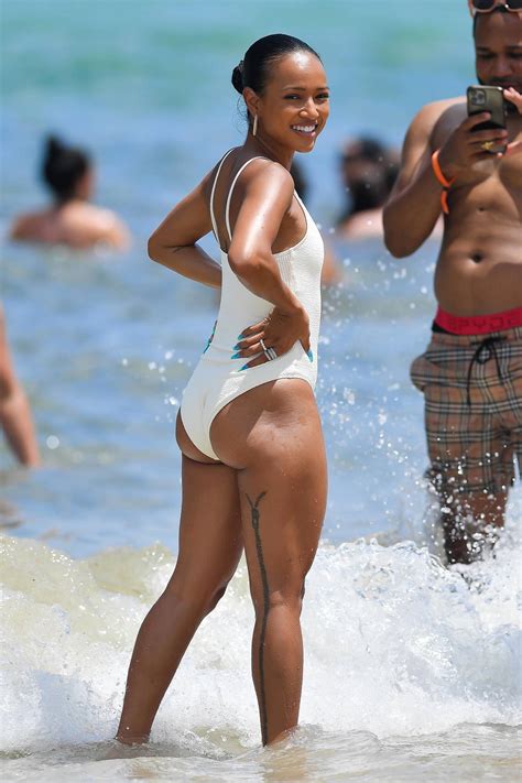 Karrueche Tran Flaunts Her Beach Body In A White Swimsuit As She Enjoys