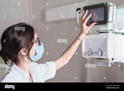 Hospital Radiology Room Beautiful Multiethnic Woman Adjusting X Ray