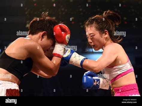 Nanako Suzuki Of Japan Right Competes Against Wong Ka Yan Of Hong