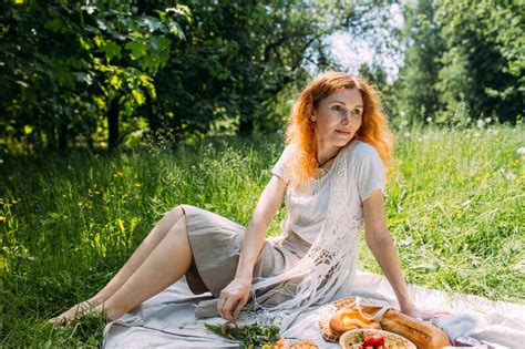 Beautiful Redhead Woman On Picnic She Smiles Eat Strawberrie And