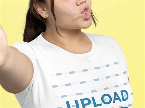 Placeit T Shirt Mockup Of A Woman Taking A Selfie With A Duckface