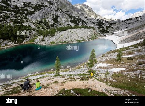 People Taking A Rest By Kidney Lake Triglav National Park Slovenia