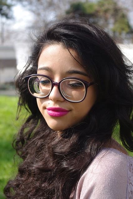 Stunning Raven Haired Girl With Long Hair Wearing Big Round Glasses