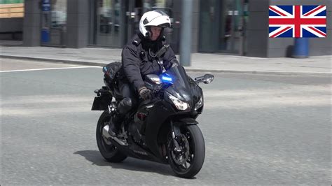 Unmarked Merseyside Police Motorcycle Performing A Traffic Stop In