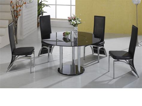 The quality is okay given the price and the chairs are adequate but pretty flimsy. Lazy susan round black glass dining table and 4 black faux ...