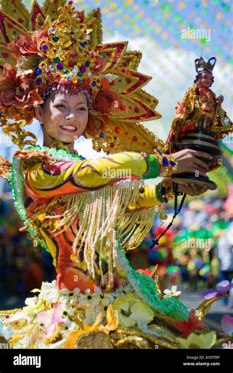 The Sinulog Festival Queen Holding An Icon Stock Photo Alamy