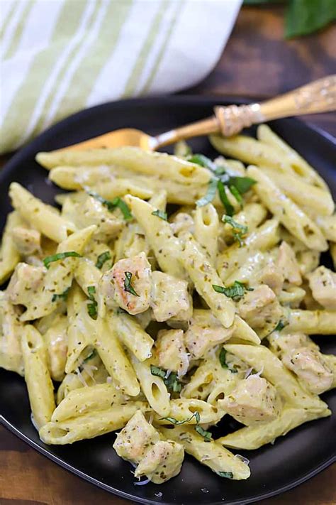 This easy creamy parmesan chicken recipe is a tasty low carb dinner idea that is incredibly quick to make with just 4 ingredients you probably already have on hand! Creamy Chicken Pesto Pasta Recipe - Yummy Healthy Easy