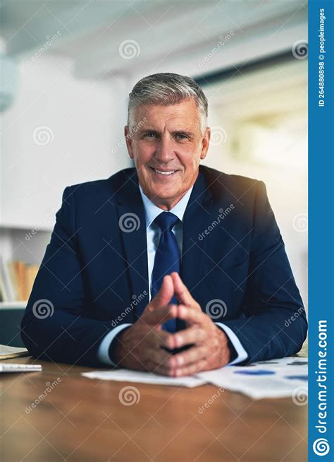 Like A Boss Portrait Of A Confident Businessman Posing Behind His Desk