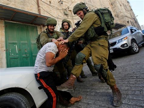Israeli Soldiers Photographed Beating Palestinian In West Bank The