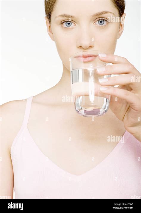 Young Woman Drinking Glass Of Water Stock Photo Alamy