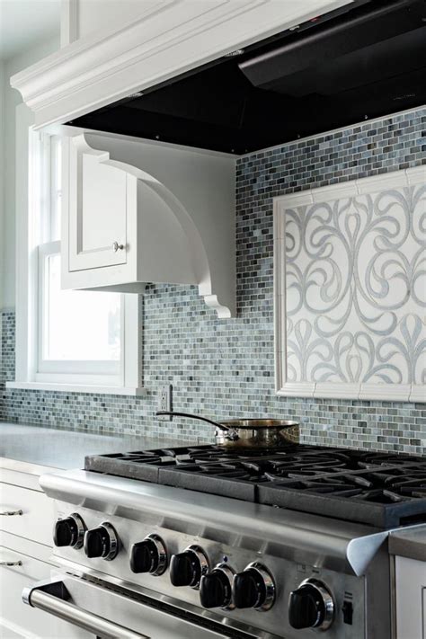 A Decorative Tile Backsplash Adds Pizzazz To The Cooking Area In This