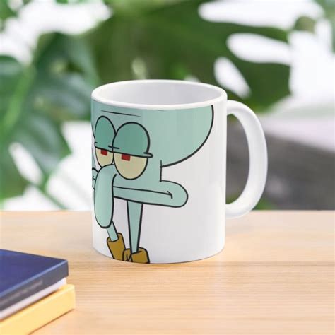 A Coffee Mug With An Image Of A Cartoon Character On It